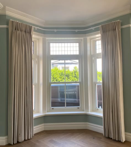 How to Style a Living Room Bay Window Like a Pro 