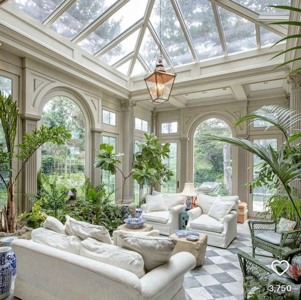 a well deorated sunroom