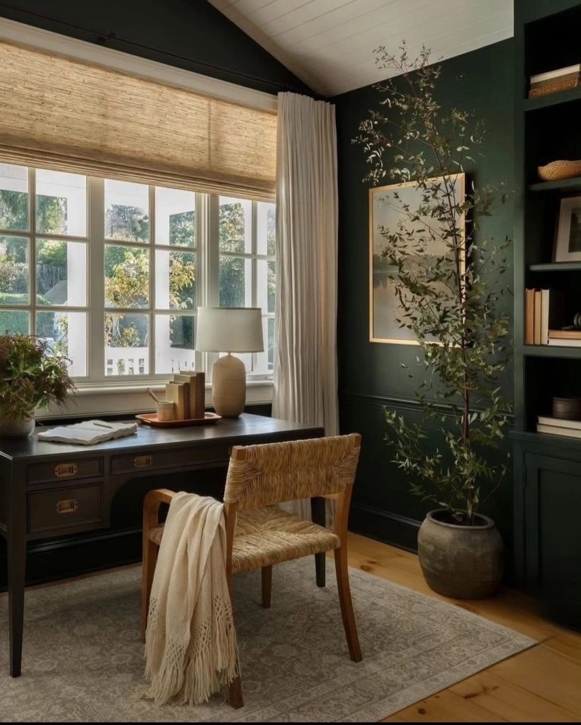 Home office with a moody dark wall
