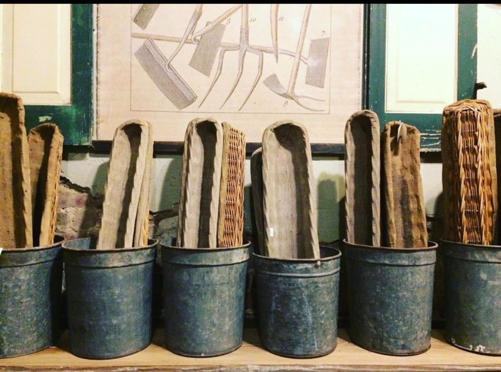Galvanized metal buckets in a mud room
