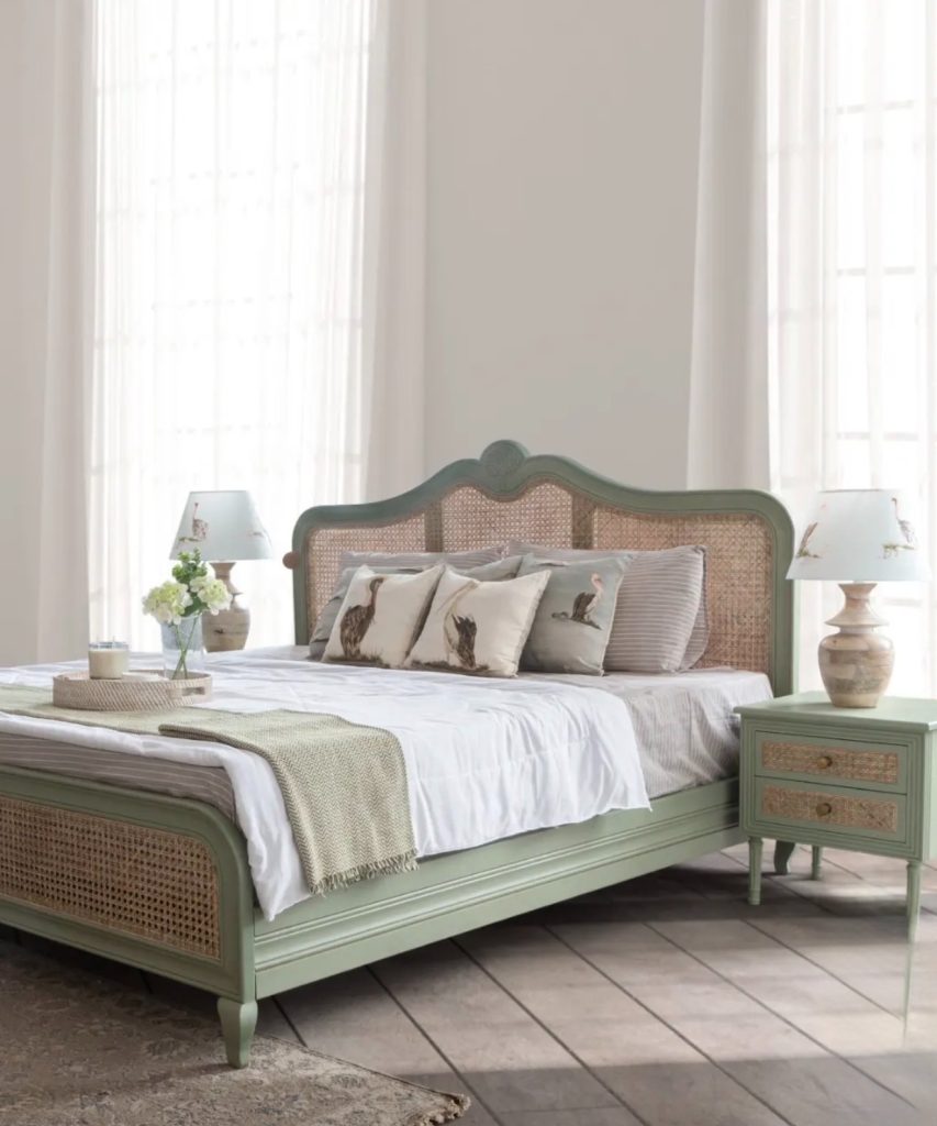French country bedroom with a muted color palette