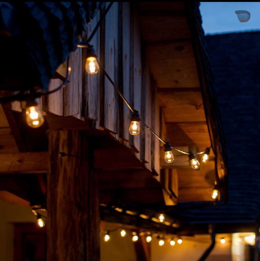 String Lights On A College Bedroom Wall