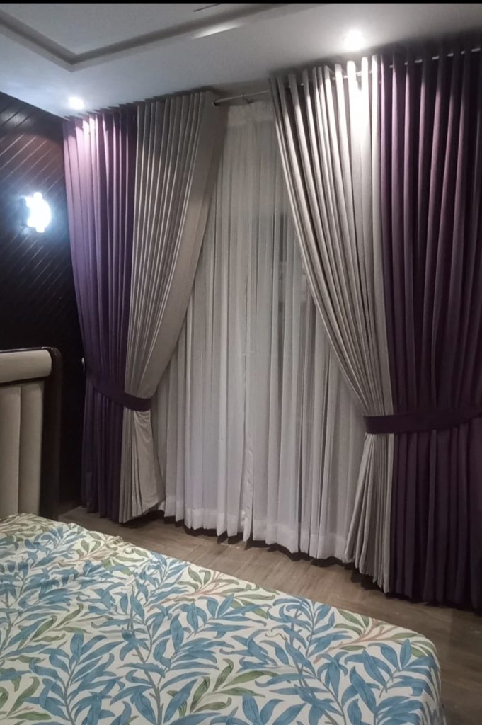 Heavy curtain in a Victorian style bedroom