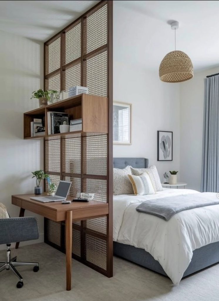 Room divider separating bedroom and home office
