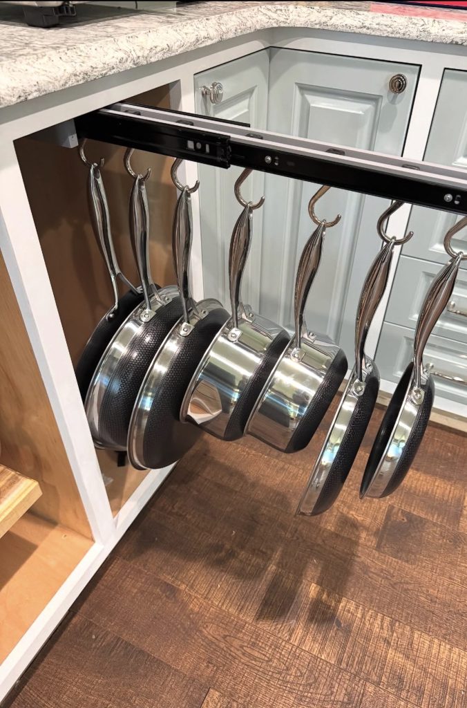 Hanging pot racks inside a cabinet