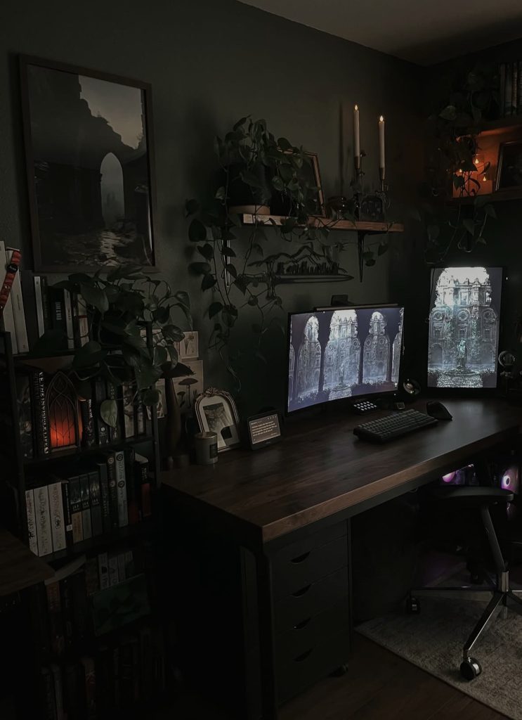 Desk setup in a moody dark academia bedroom