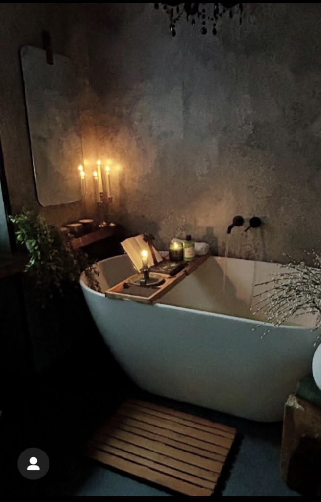 Candles in dark academia bathroom 
