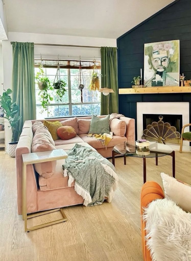 Pattern throw pillow and blankets in a boho living room 