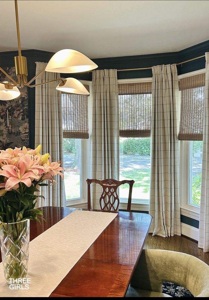 Sheer curtain in a dining room bay window 