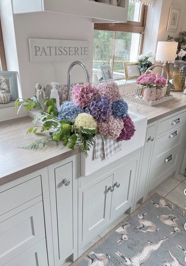 Vintage fresh flowers in a English Cottage Style Kitchen 