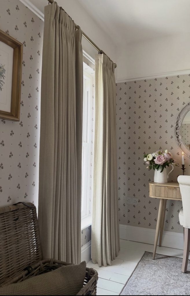Guest bedroom with cozy curtains