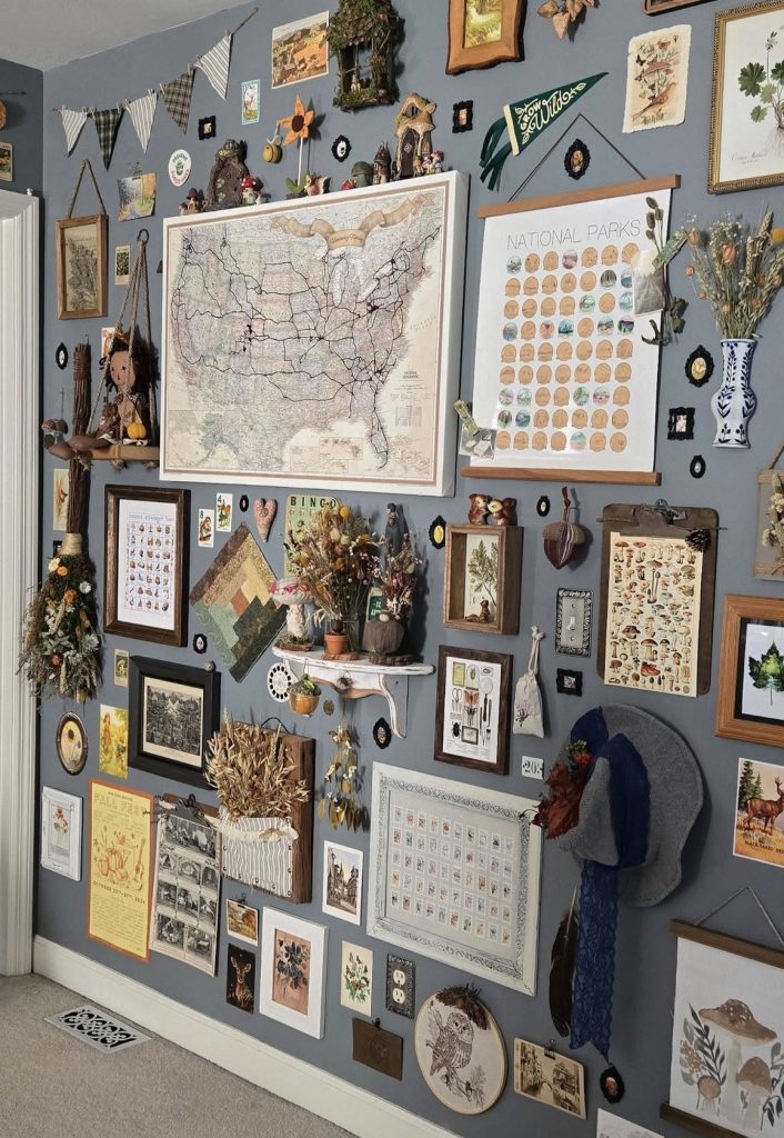 Maps and old books used as a bedroom gallery wall