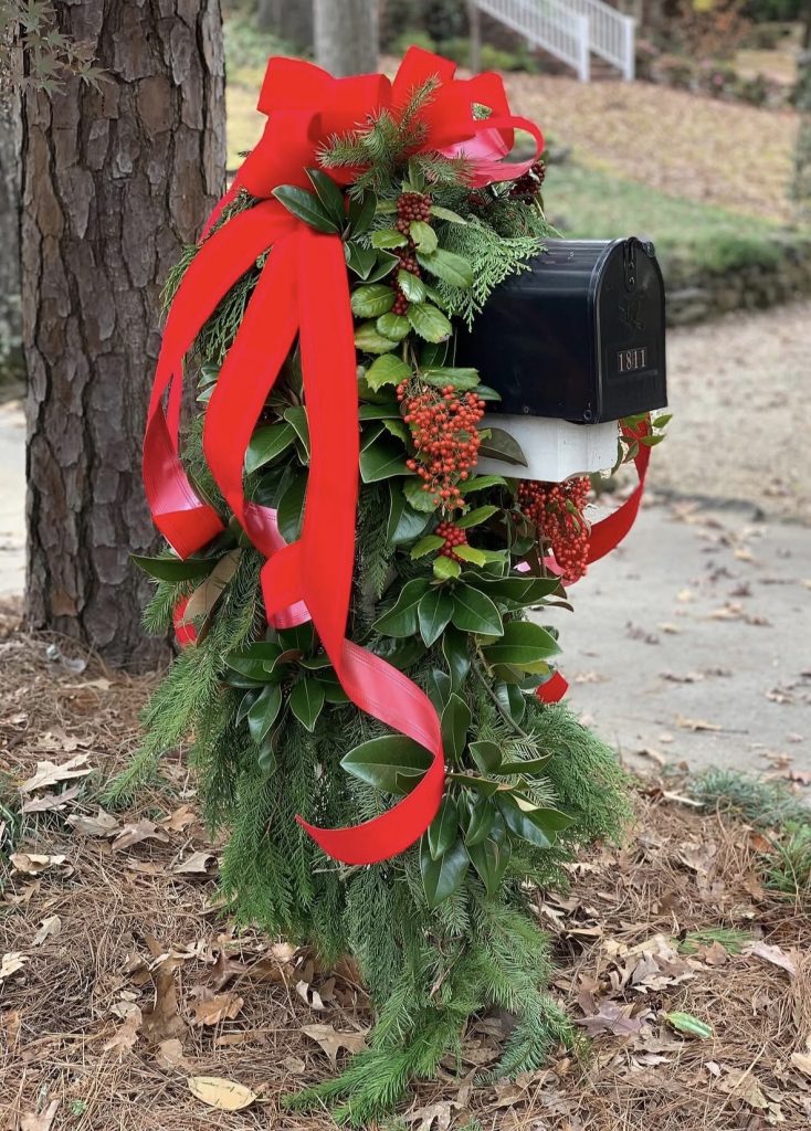 Mailbox decorated with Greenery and bow 