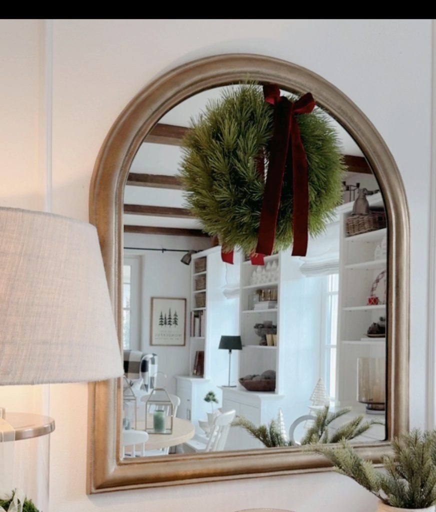 Christmas wreath on a bathroom mirror