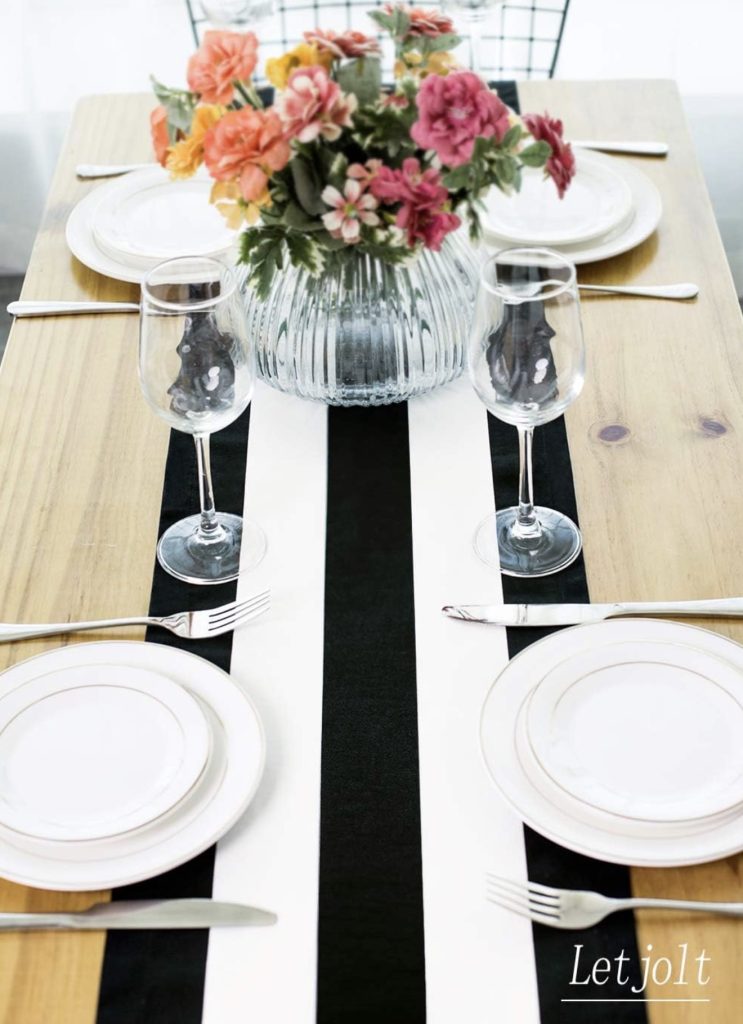Black and White Striped Runner With Natural Placemats