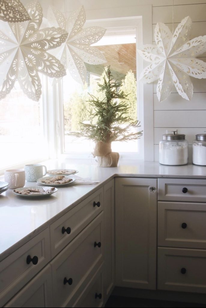 Kitchen Window With Paper Snowflakes