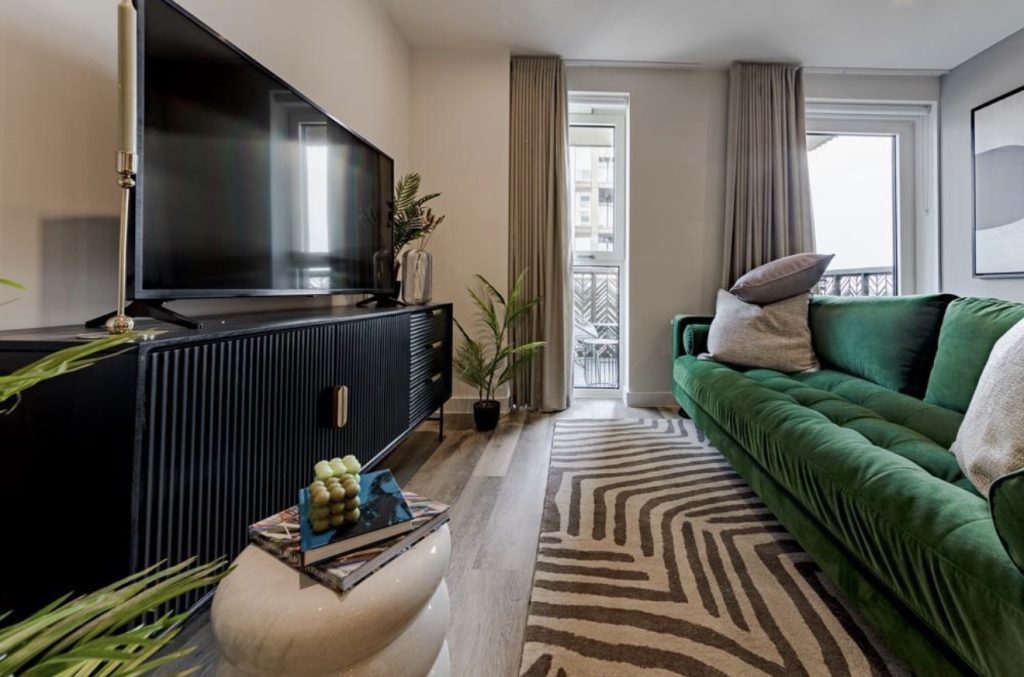 Emerald Green Sofa With Black Furniture