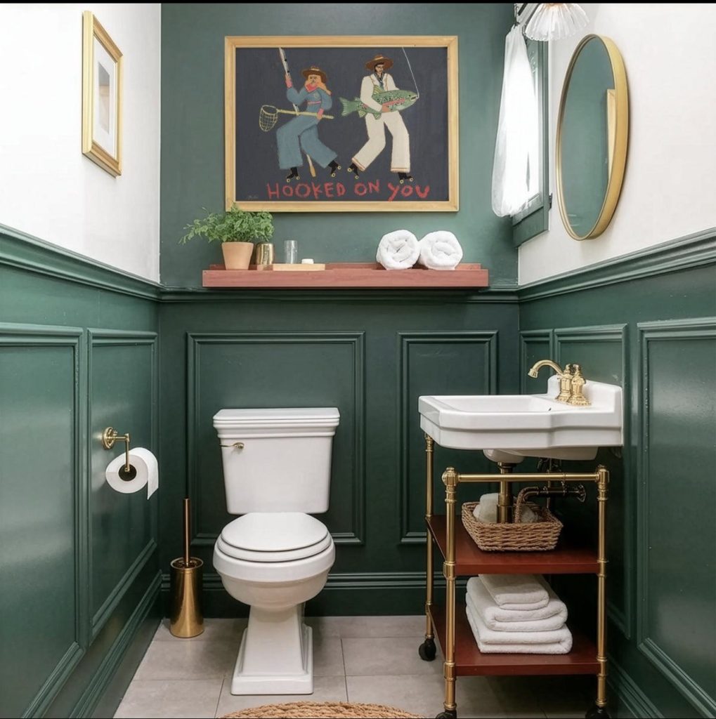 Dark Green Wainscoting With a Decorative Picture Ledge