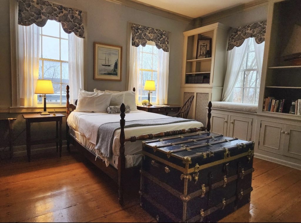 Antique Trunks, Lace Curtains, and Warm Lighting