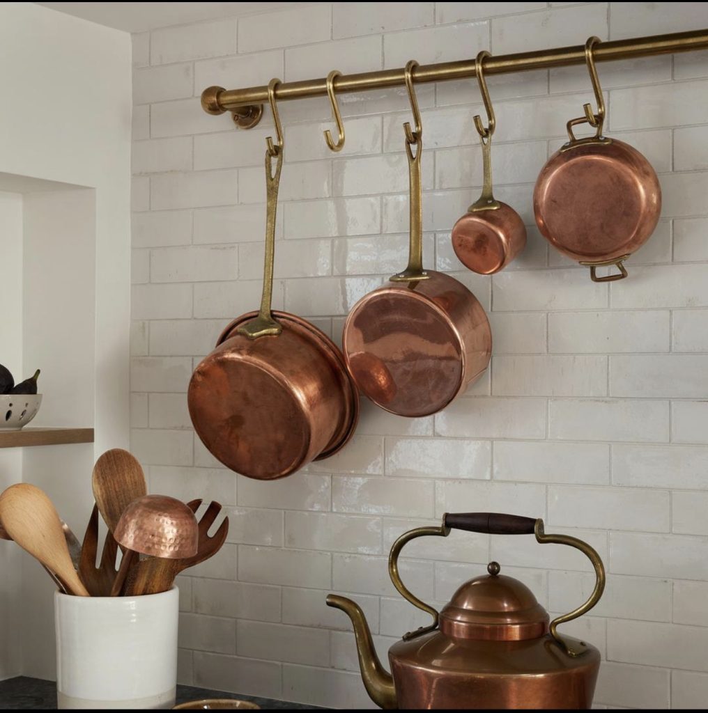 Hanging Pot Rail With Vintage Cookware and Utensils